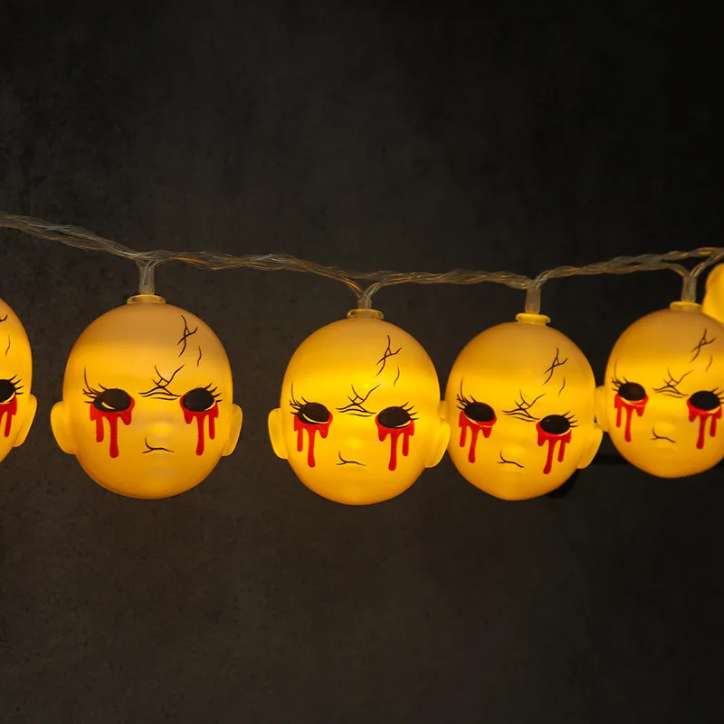 LED Accessories with creepy baby head string lights for Halloween party decor.