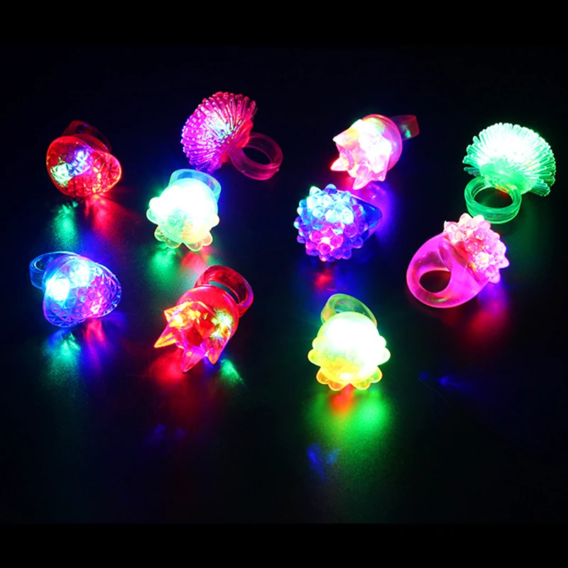 Assorted LED Party Favors rings glowing brightly for kids and party guests.