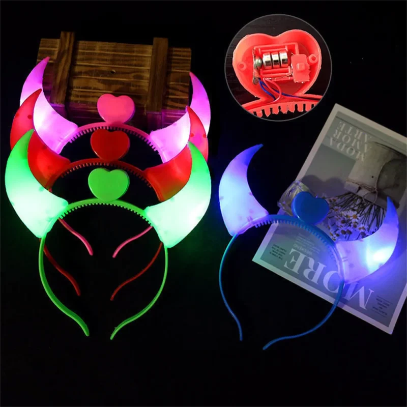 LED devil horn headbands glowing in multiple colors alongside glow stick necklaces.